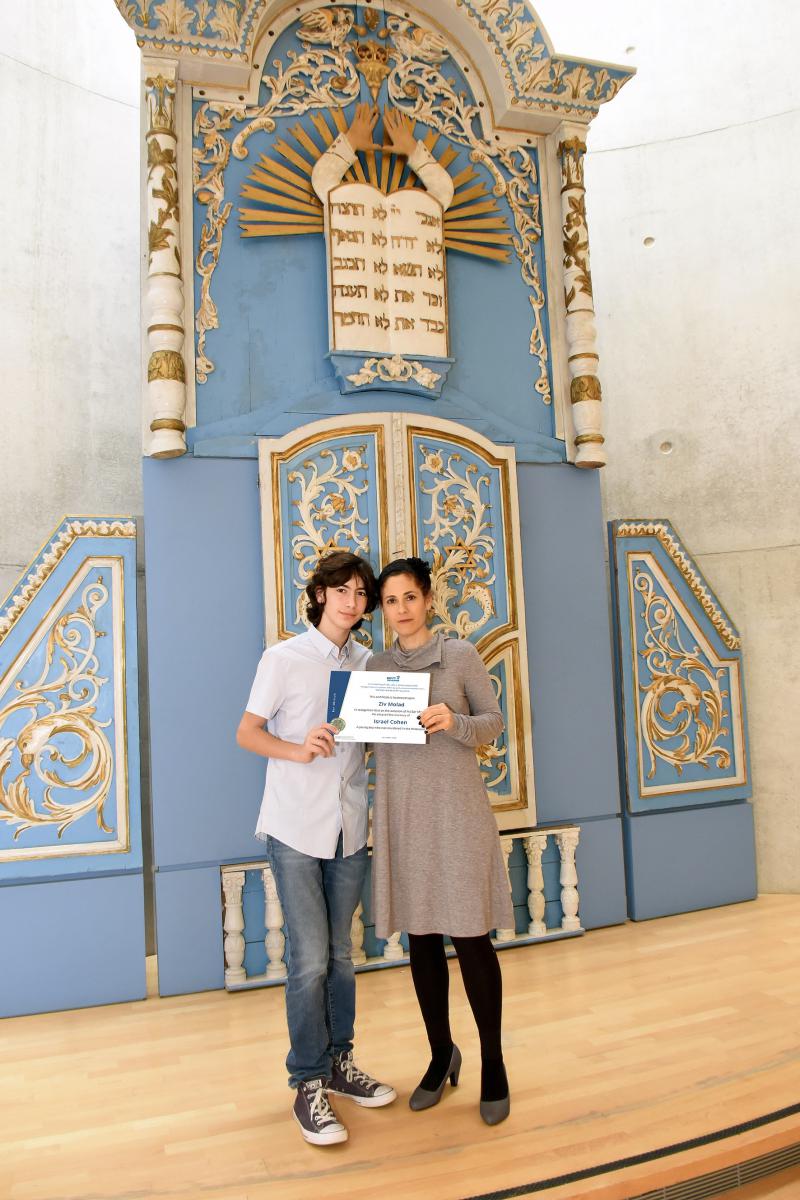 Mother and Bar Mitzvah boy participating in a Twinning ceremony